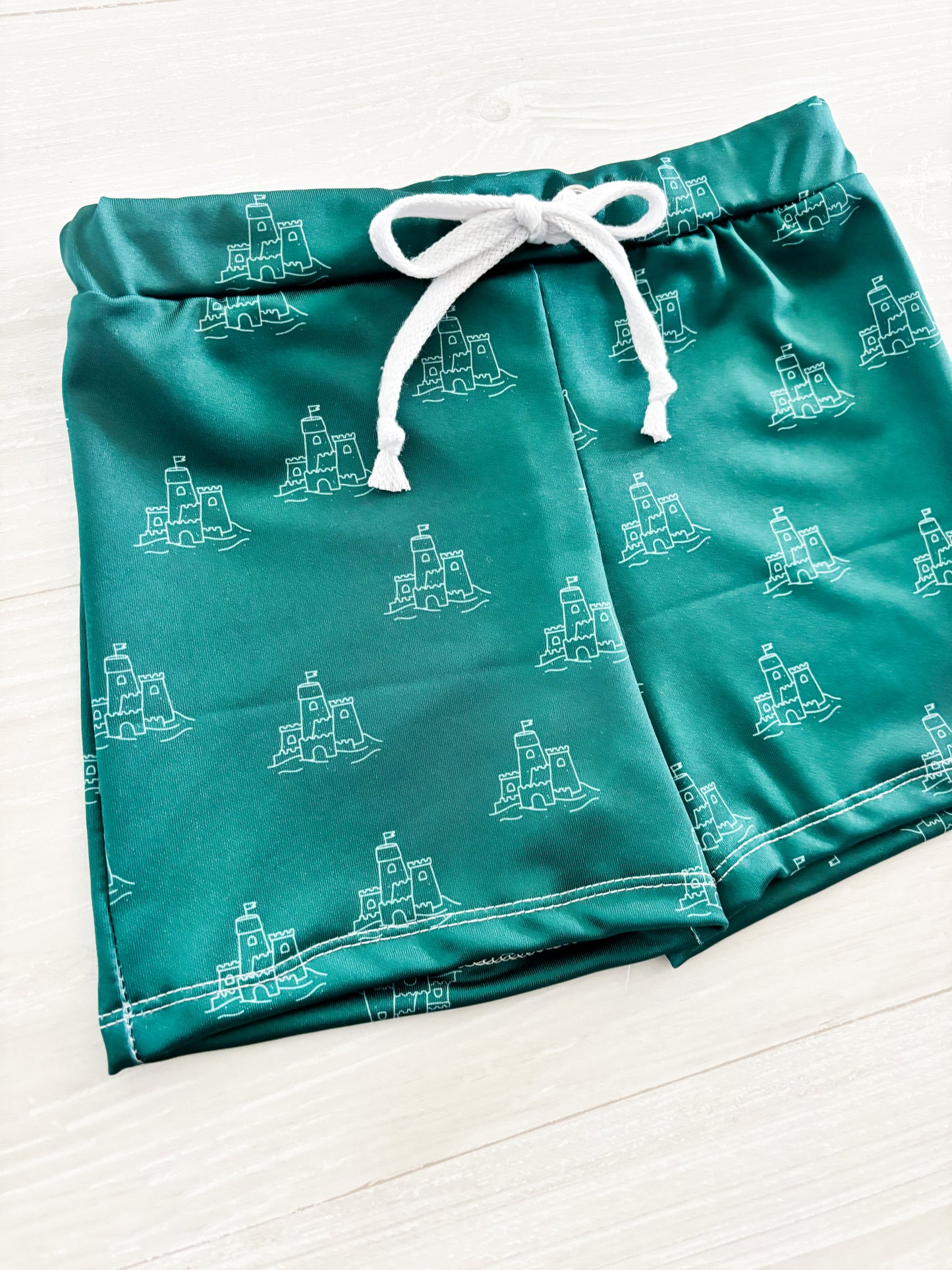 Teal Sandcastle Swim Trunks